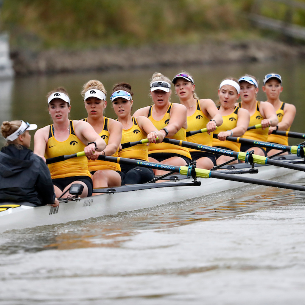 Eight rowers in a boat on the Iowa River