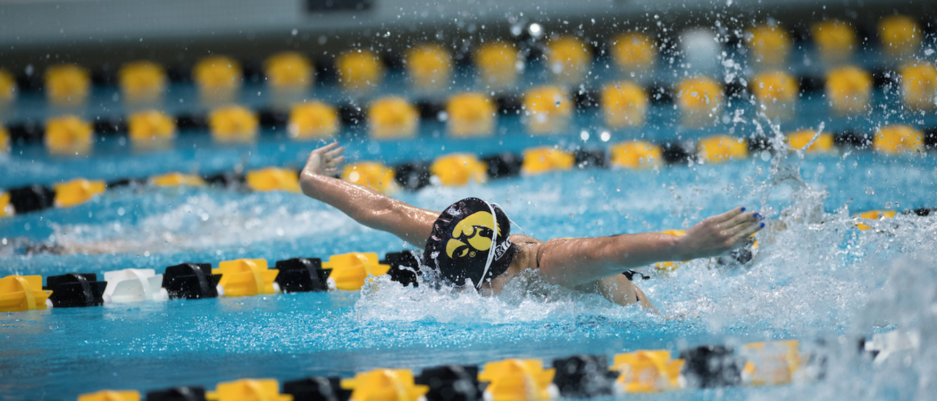 swimmer competing in the butterfly